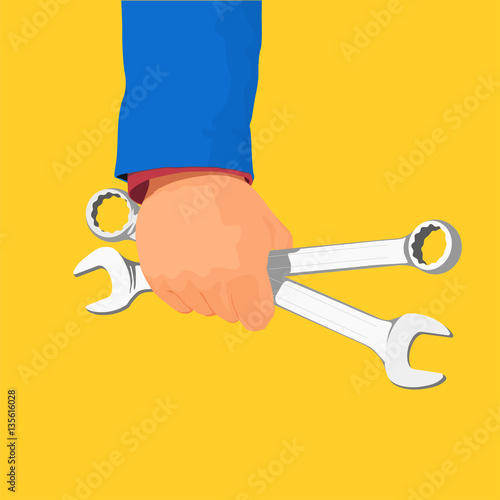 Hand of car mechanic with wrench. Auto repair garage.