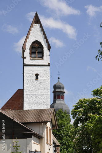 türme der evangelischen und katholischen kirche nebeneinander in zell photo