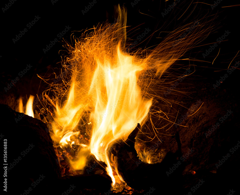 fire with sparks on a black background