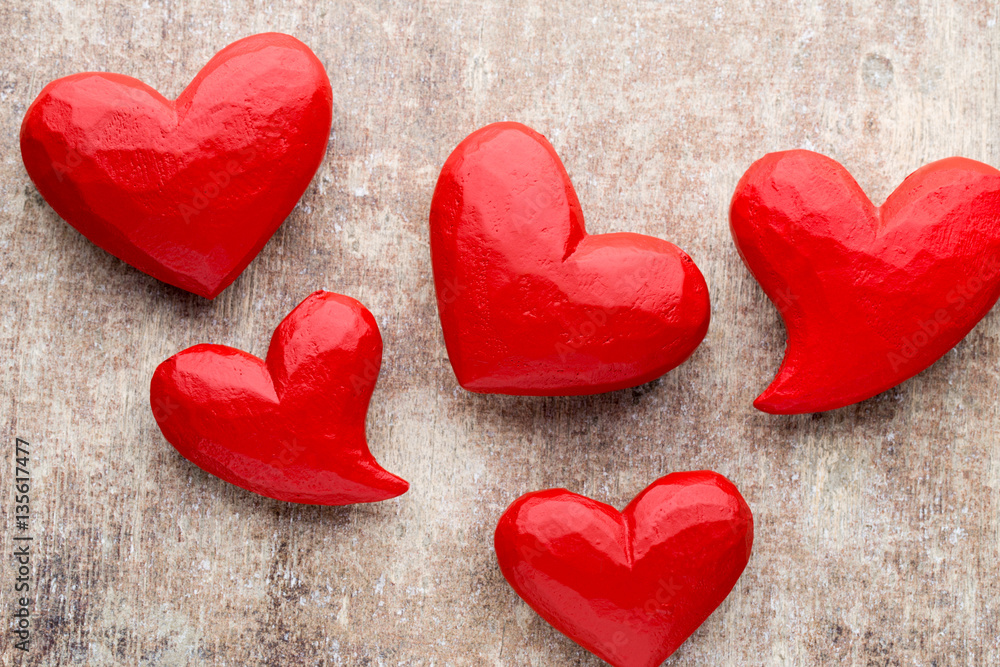 Obraz premium Red heart on the wooden background.