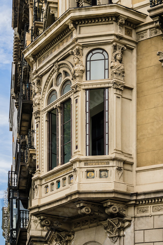 Building facade: Old style windows, balcony. Barcelona. Spain. © dbrnjhrj