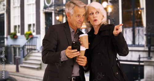 Smart seniors using smartphone to find their way home