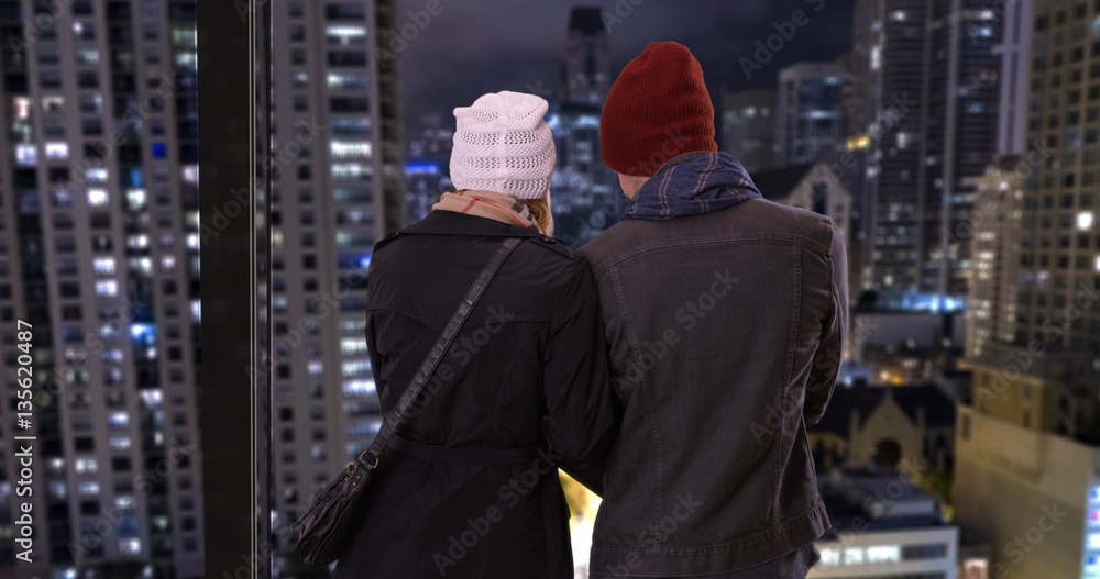 Yuccie couple enjoying the rooftop view Yuccie couple enjoying the rooftop view