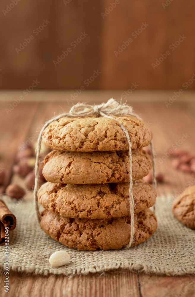 Homemade oat cookies on a wooden background Homemade oat cookies on a wooden background