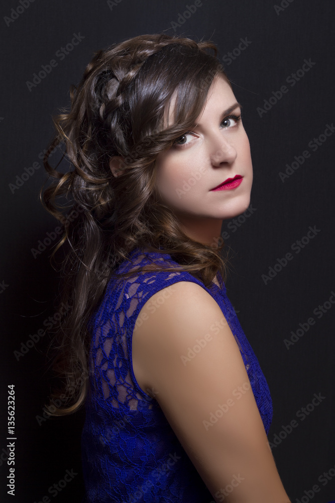 Fototapeta premium Elegant hairstyle with braids on beautiful woman.