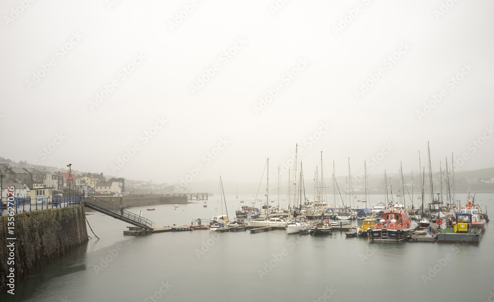 Falmouth harbour in  low cloud, mist and rain