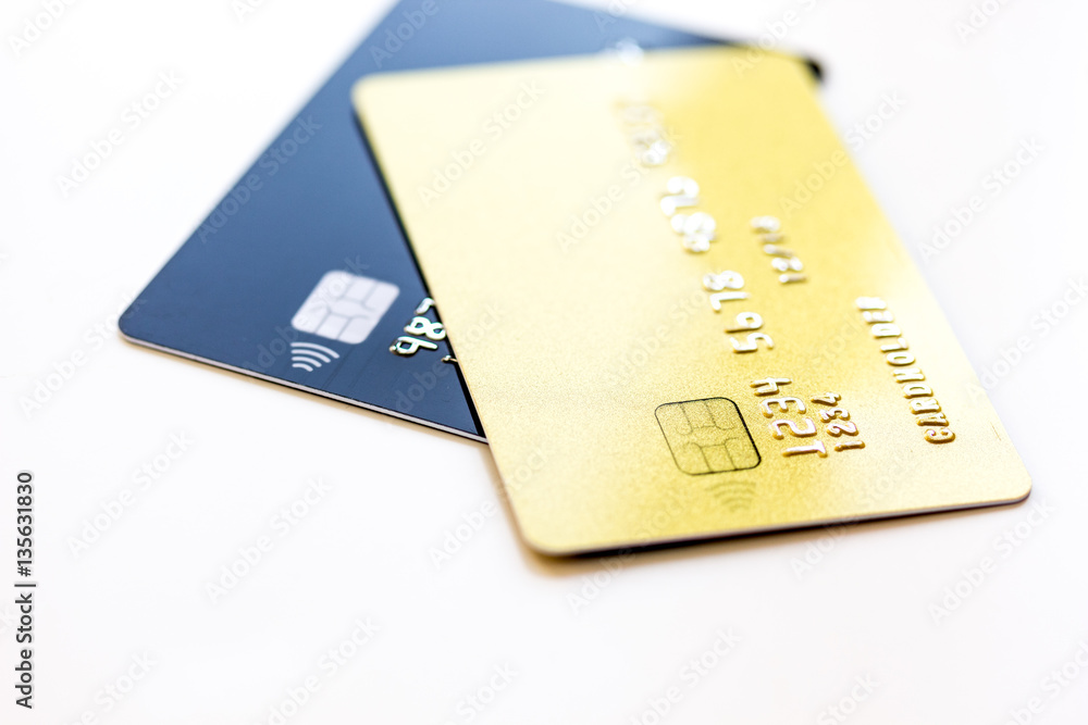 pile of credit cards on white background pile of credit cards on white background