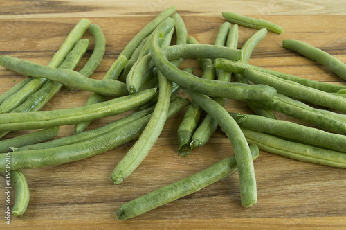 Green beans on wood table