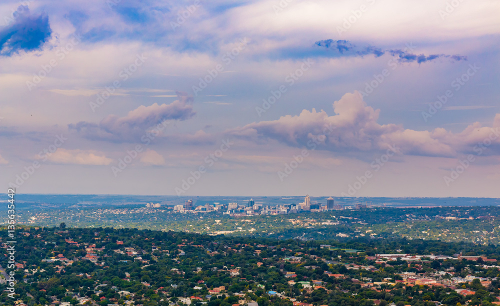 Fototapeta premium Purple Clouds above Sandton Skyline Gauteng South Africa Elevated view