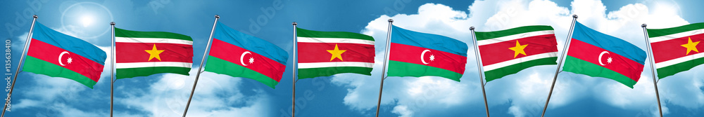 Azerbaijan flag with Suriname flag, 3D rendering Azerbaijan flag with Suriname flag, 3D rendering