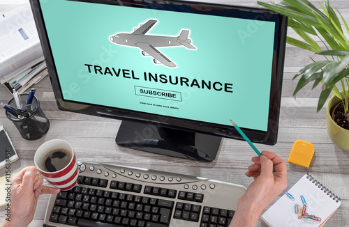 Travel insurance concept on a computer
