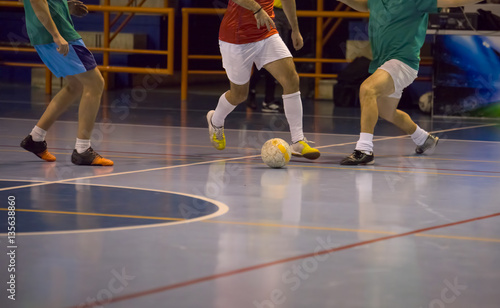  Futsal player  in the sports hall © Baronb