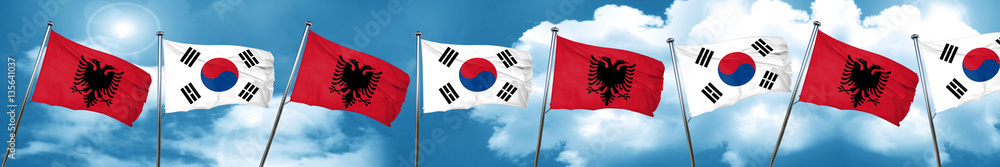 Albania flag with South Korea flag, 3D rendering Albania flag with South Korea flag, 3D rendering