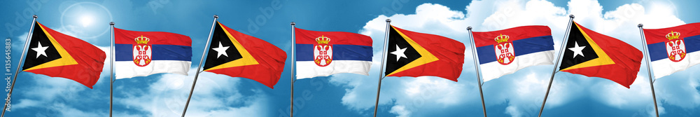 east timor flag with Serbia flag, 3D rendering east timor flag with Serbia flag, 3D rendering