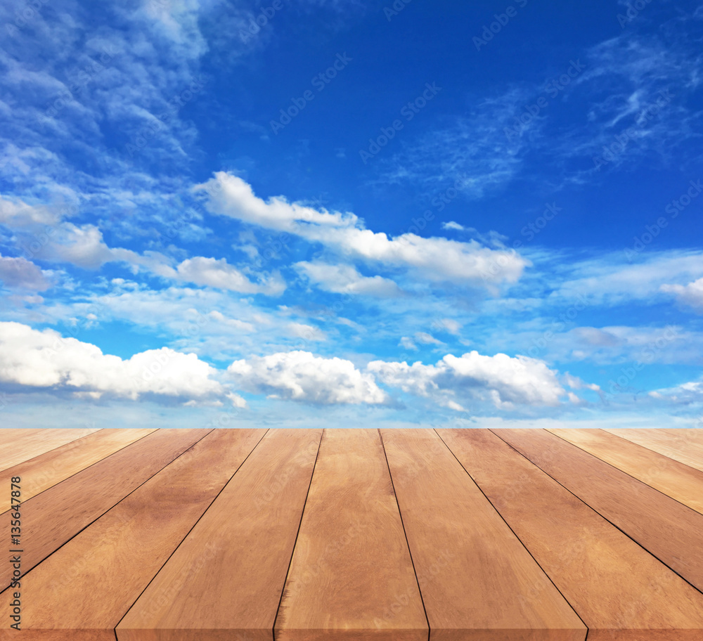 Wood table top and beautiful sky background Wood table top and beautiful sky background