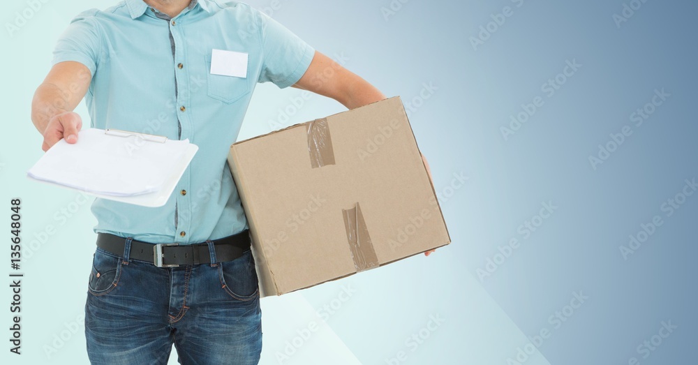 Mid section of delivery man holding parcel box and clipboard Mid section of delivery man holding parcel box and clipboard