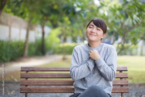 Woman with relax time at the park