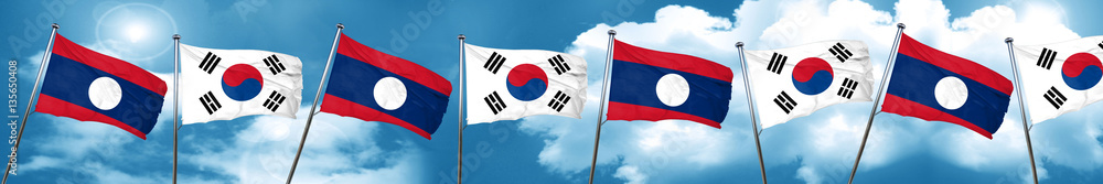 Laos flag with South Korea flag, 3D rendering Laos flag with South Korea flag, 3D rendering