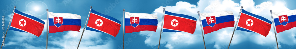 North Korea flag with Slovakia flag, 3D rendering North Korea flag with Slovakia flag, 3D rendering