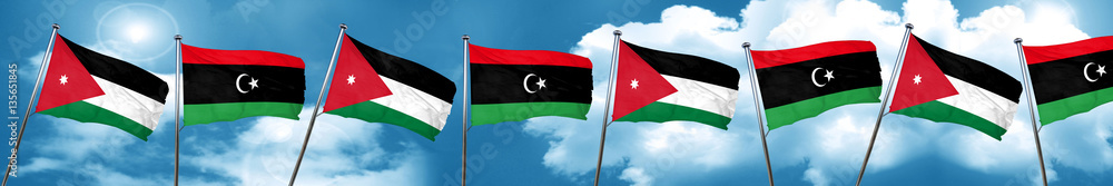 Jordan flag with Libya flag, 3D rendering Jordan flag with Libya flag, 3D rendering