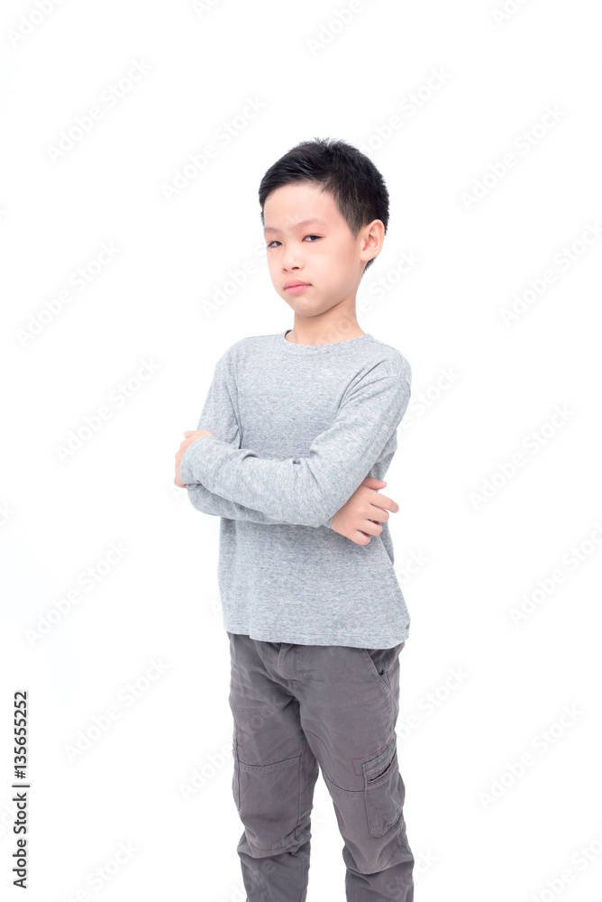 Young asian boy standing over white background Young asian boy standing over white background