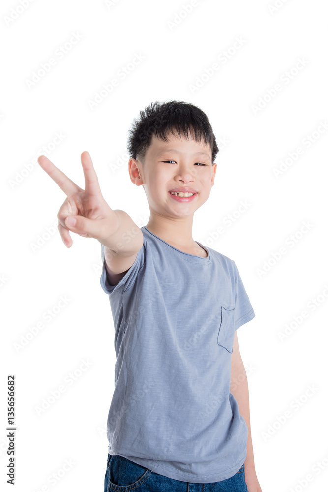 Young asian boy smiling over white background Young asian boy smiling over white background