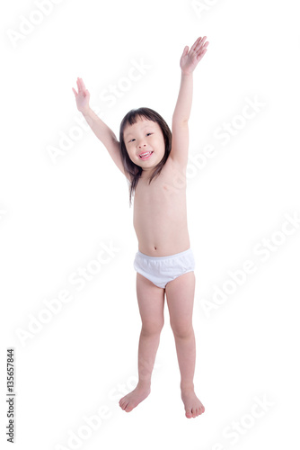 Little asian girl smiles and hands up over white