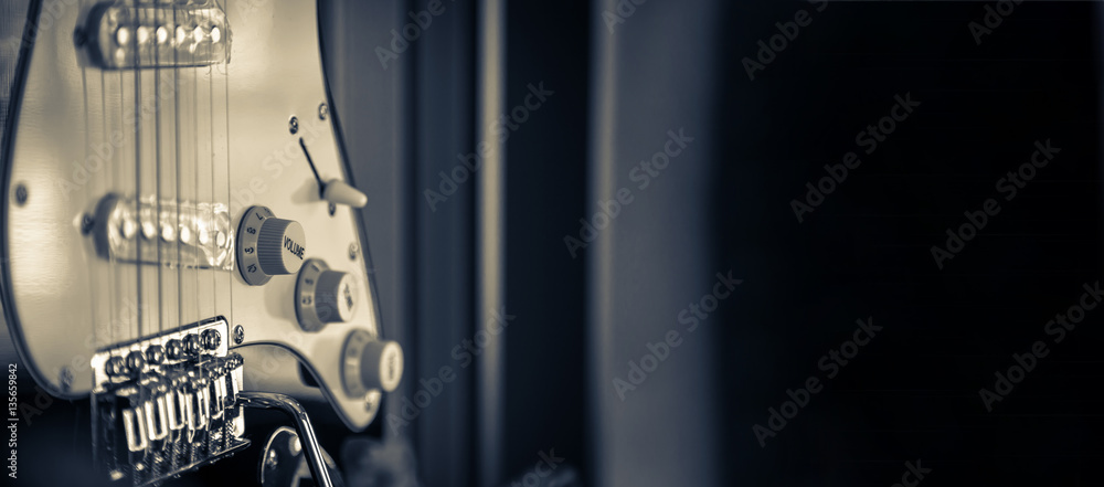 Obraz premium closed up guitar in soft light from window