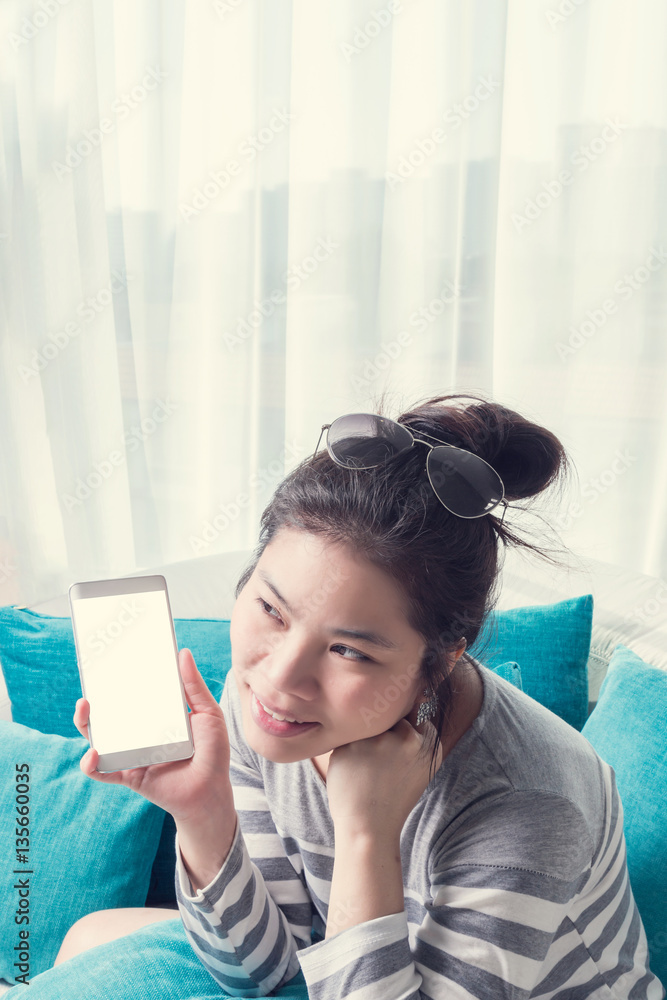 beautiful cute asian girl working with smartphone with moment of beautiful cute asian girl working with smartphone with moment of