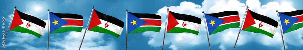 Western sahara flag with South Sudan flag, 3D rendering Western sahara flag with South Sudan flag, 3D rendering