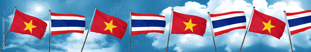 Vietnam flag with Thailand flag, 3D rendering Vietnam flag with Thailand flag, 3D rendering