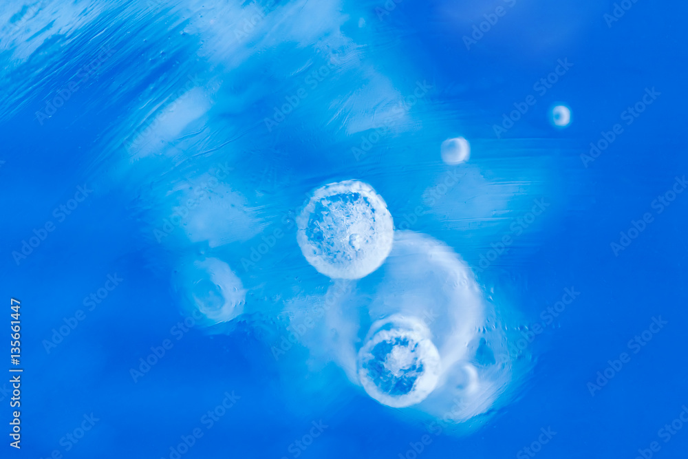 Blue ice with bubbles, background Blue ice with bubbles, background