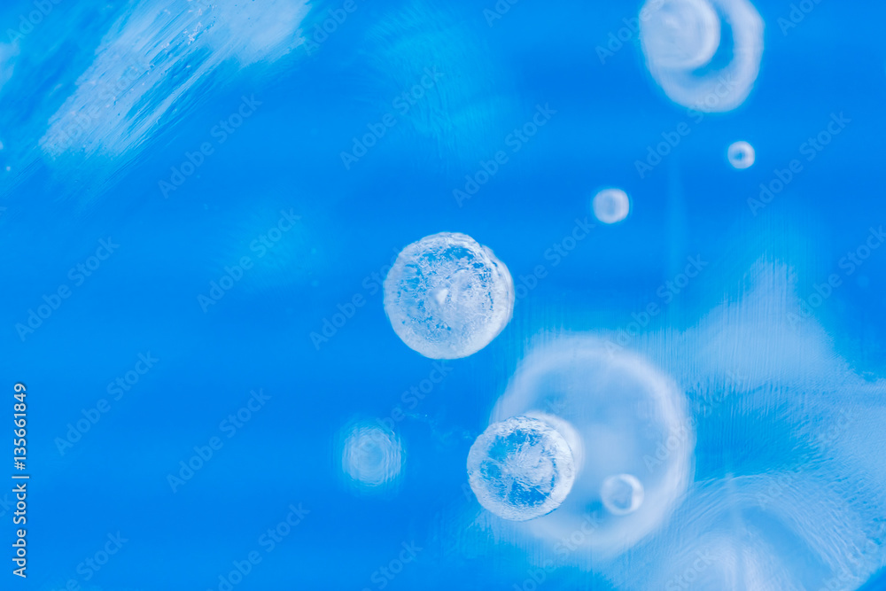Blue ice with bubbles, background Blue ice with bubbles, background