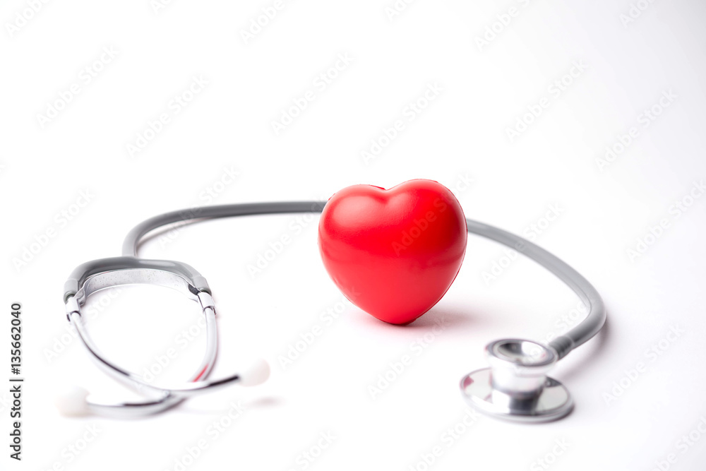 Medical stethoscope and heart isolated on white Medical stethoscope and heart isolated on white