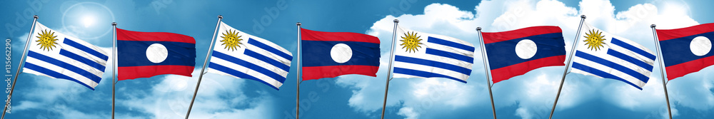 Fototapeta premium Uruguay flag with Laos flag, 3D rendering