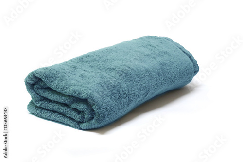 Folded blue warm blanket isolated on white