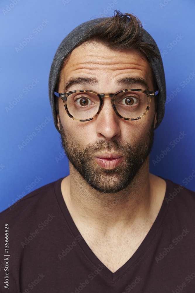 Surprised guy in hat and spectacles, portrait Surprised guy in hat and spectacles, portrait
