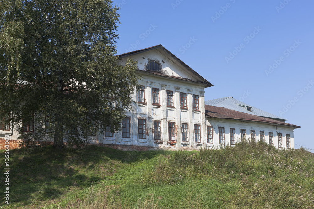 Building of the former hotel for pilgrims Spaso-Sumorin Monastery in the town of Totma, Vologda Region, Russia
