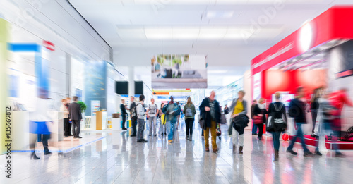 Fotografie blurred business people at a trade fair stock photo