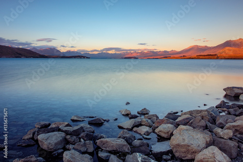 Long exposure landscape view of Lake Tekapo and mountains, NZ