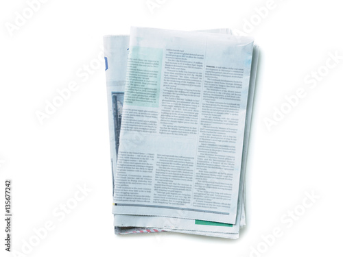 Top view stack newspaper on white background