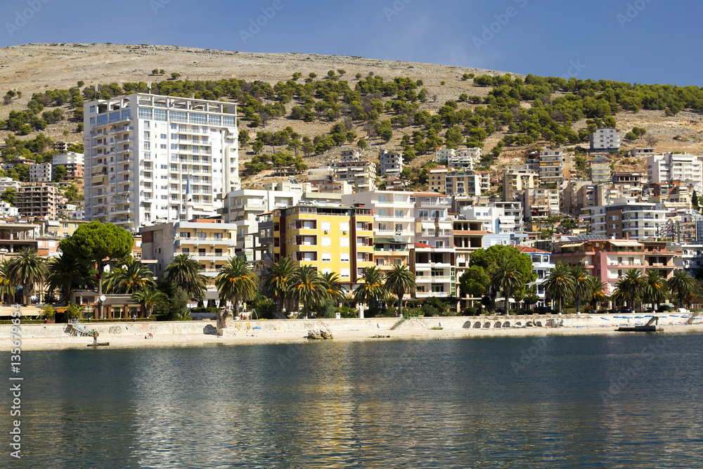 Adriatic coast with the sea and the town (Albania). Coast Resort.