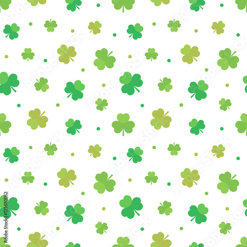 St.Patrick's Day seamless pattern background with green clover, shamrock and dots.