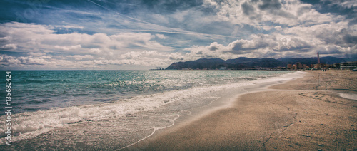 Italian seascape with gorgeous cloudscape letterbox