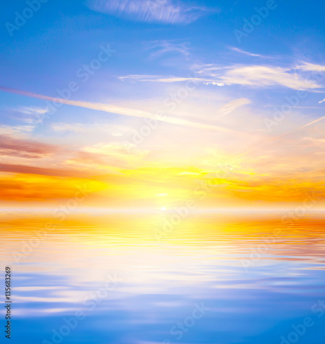  Sunset reflected in a water 