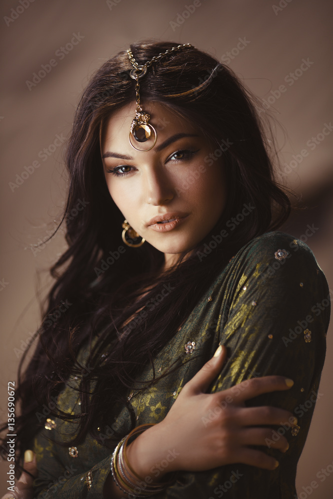 Beautiful woman with fashion makeup and hairstyle like Egyptian