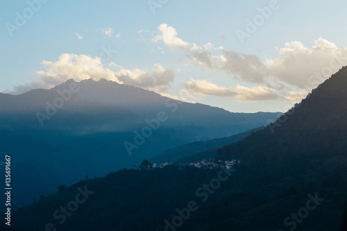 The view of beautiful mountains and village in the cultural landscape of Duoyishu Honghe Yunnan province  China