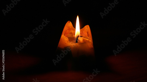 pyramidal candle burns down