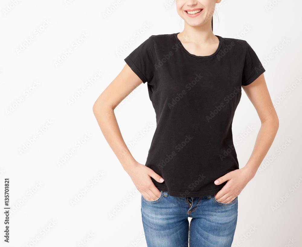 Obraz premium T-shirt design, people concept - closeup of young woman in blank black t-shirt, shirt, front isolated. Mockup square.