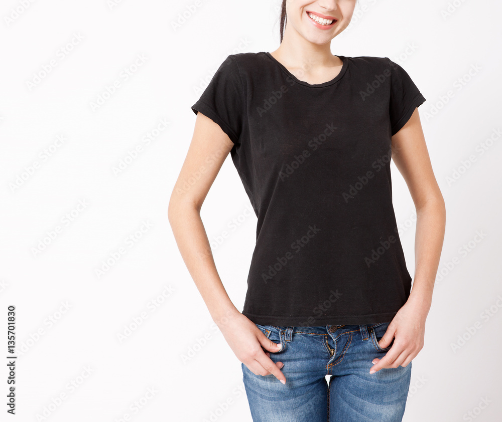 Obraz premium T-shirt design, people concept - closeup of young woman in blank black shirt, front isolated. Mockup square.